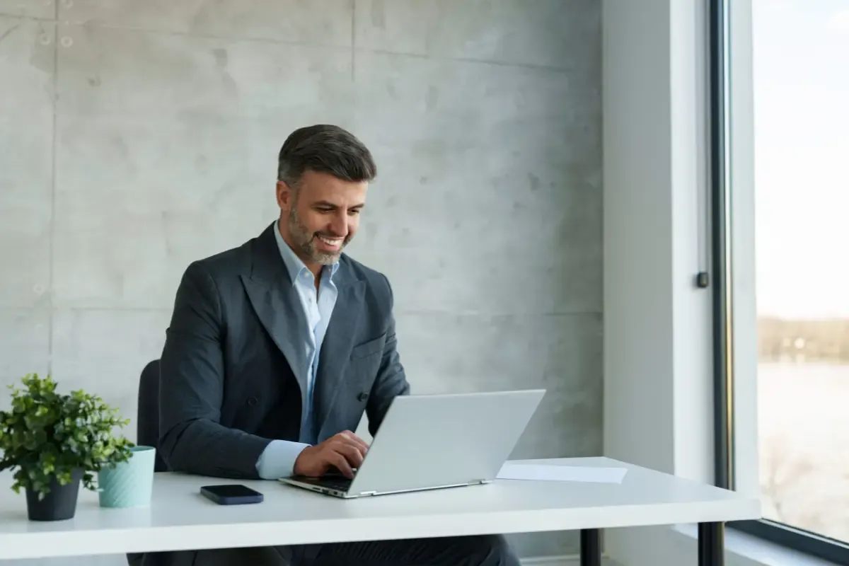 annual-business-filings-img.webp Business owner completing annual business filings and corporate filings online to maintain annual compliance and avoid business penalties for late LLC filings.