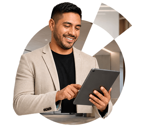 Business professional using a tablet to manage business services and compliance.