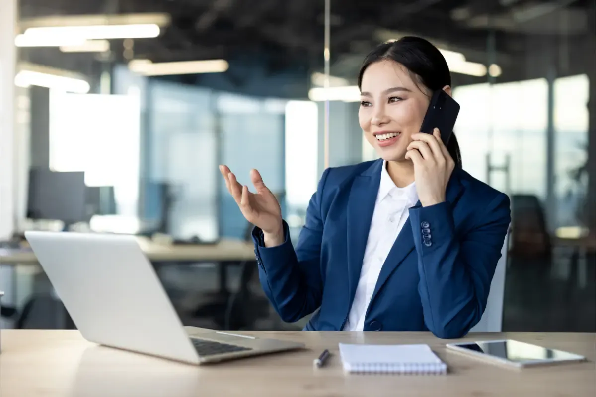 can-i-be-my-own-registered-agent-for-my-business-img.webp Professional handling registered agent duties and business calls demonstrating can I be my own registered agent responsibilities and requirements.