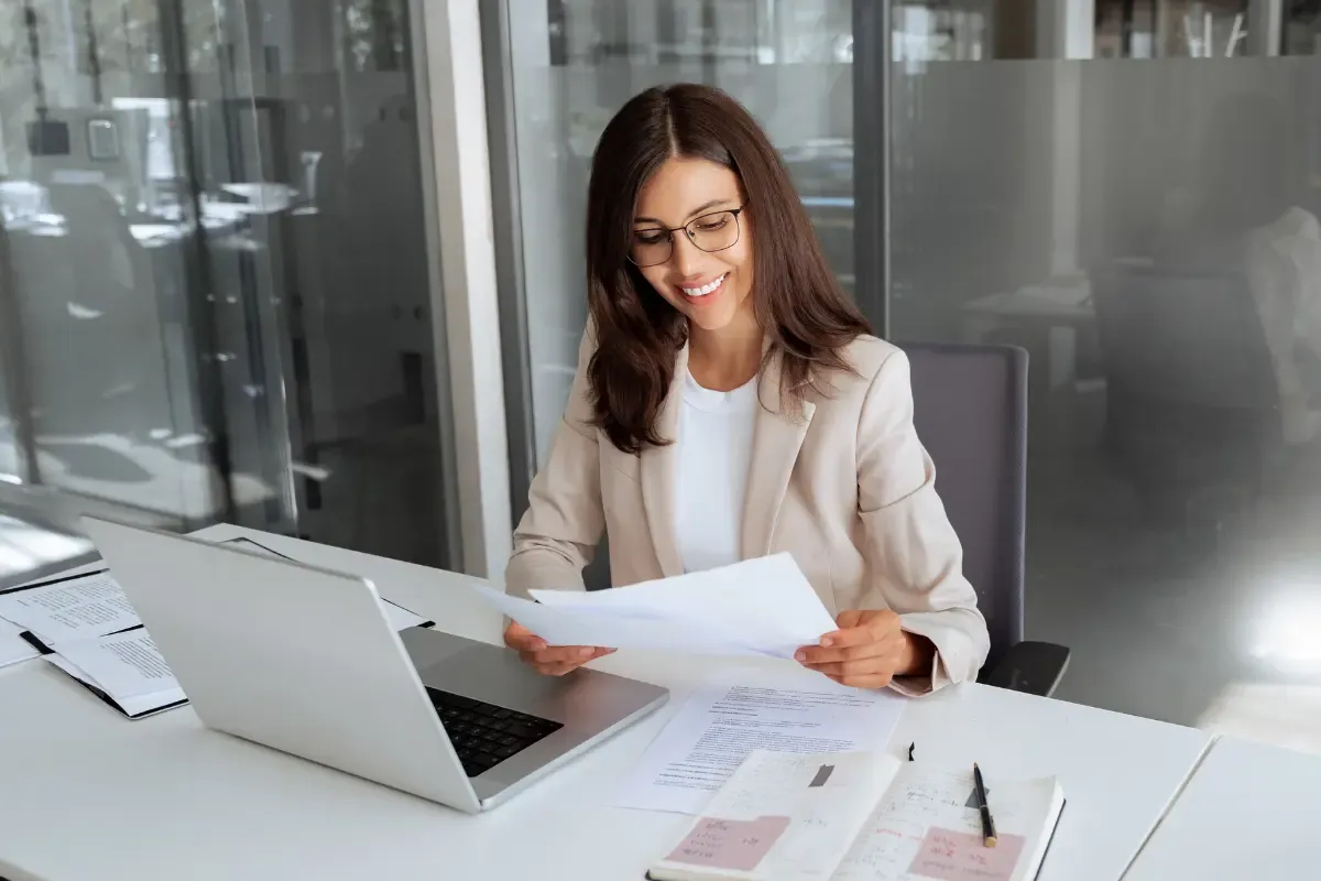 certified-articles-of-organization-img.webp Business owner reviewing certified articles of organization and LLC formation documents received from the secretary of state as a certified copy
