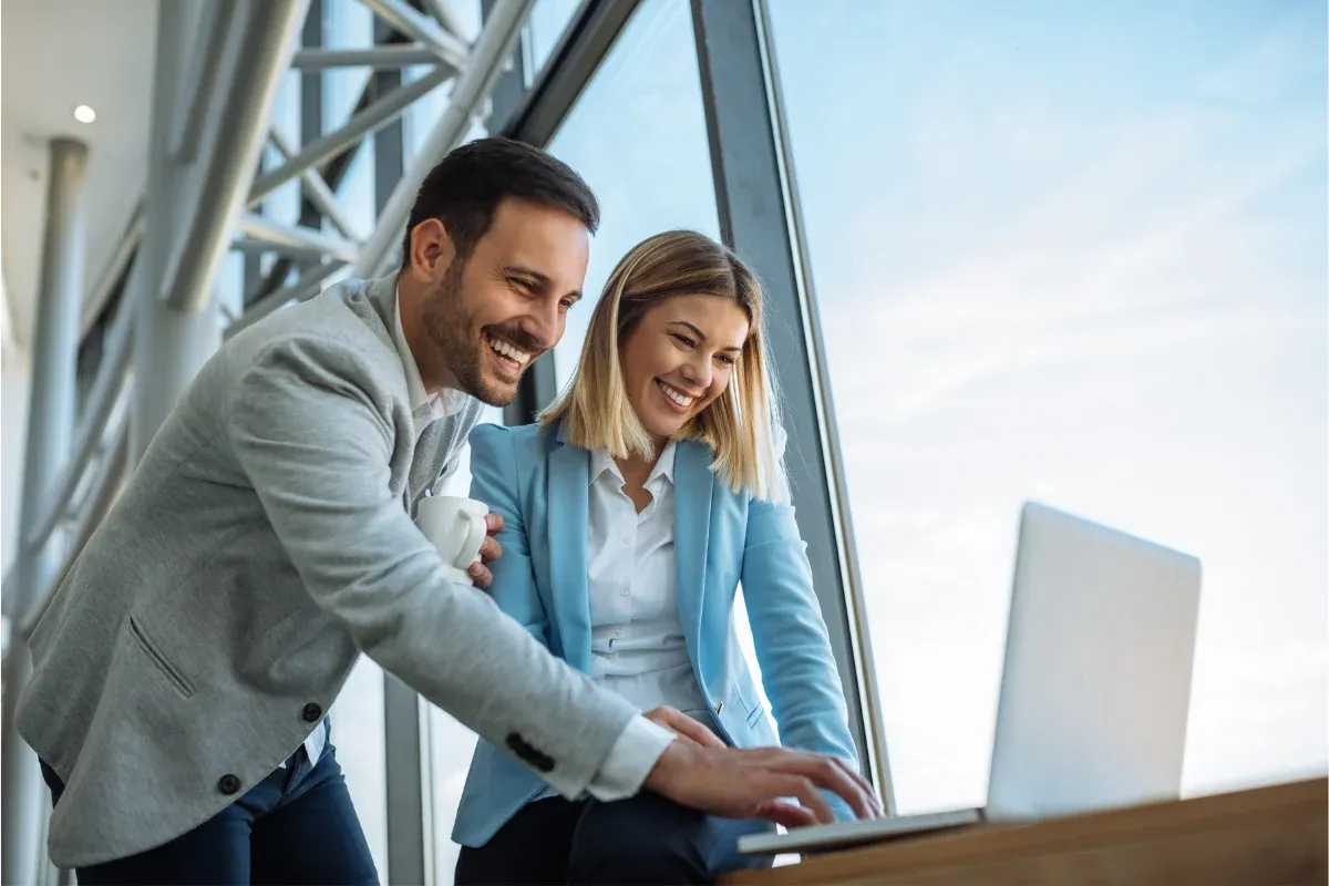 hire-a-registered-agent-img.webp Business professionals consulting on hiring registered agent services for company compliance and legal document handling requirements.