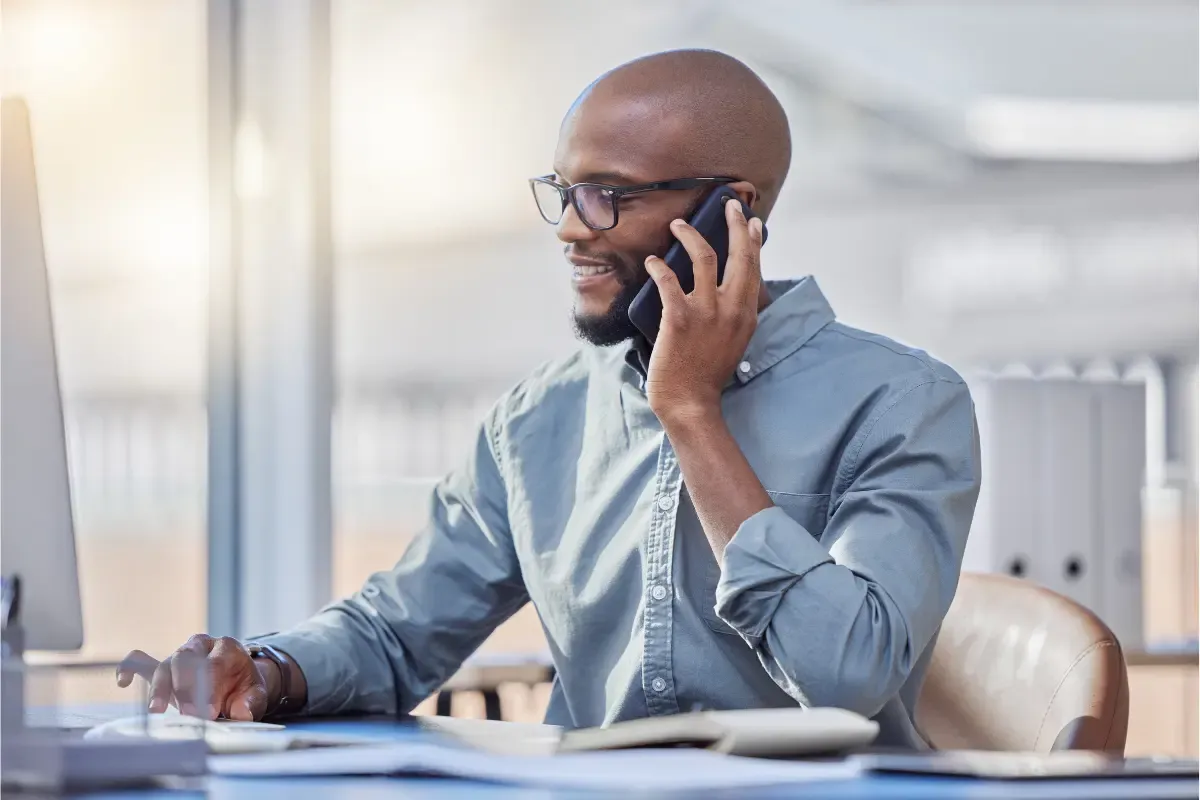 Small business owner researching how much it costs to start an LLC in 2026 including state filing fees, registered agent fees, and LLC formation service costs