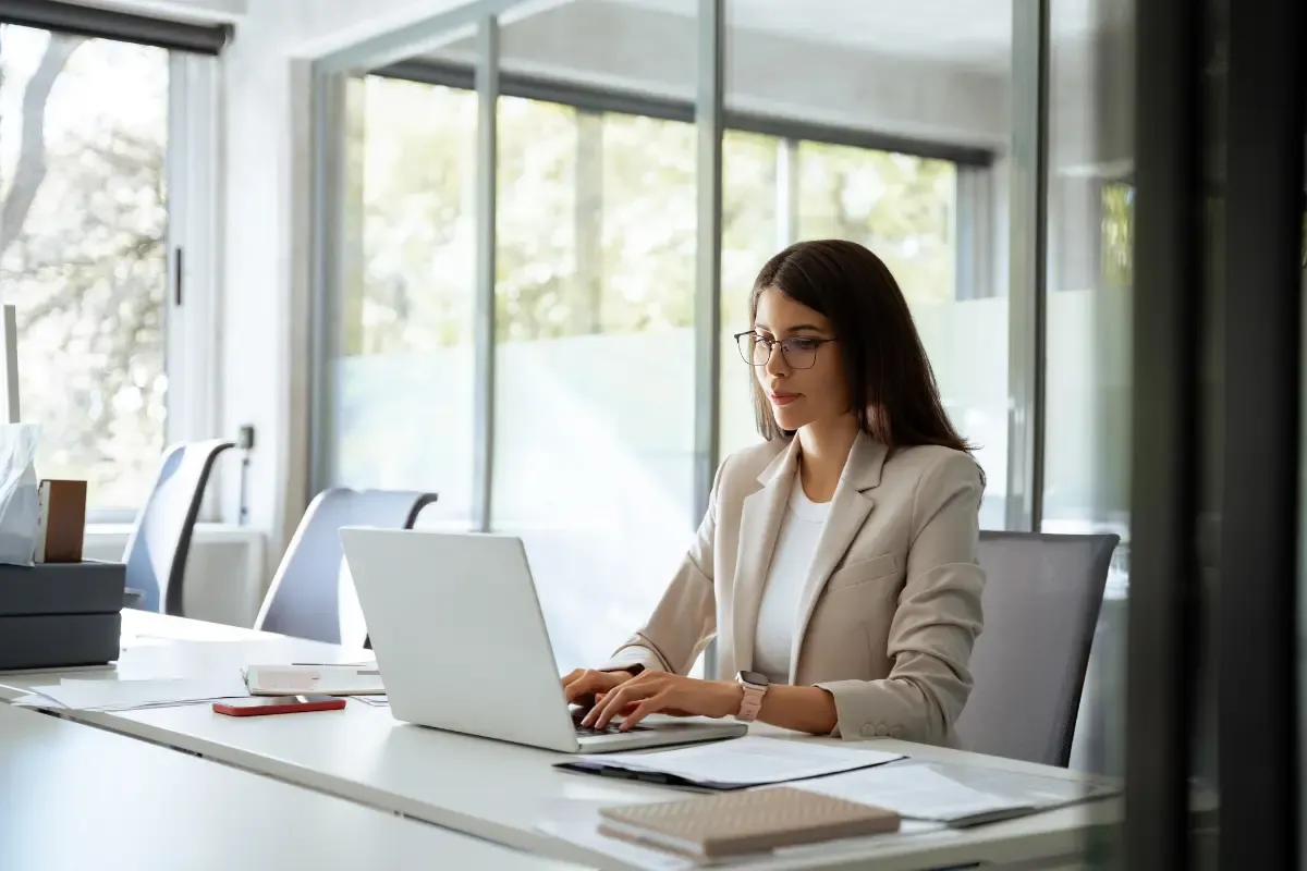 Business owner researching how to cancel business license and dissolve a business legally online.