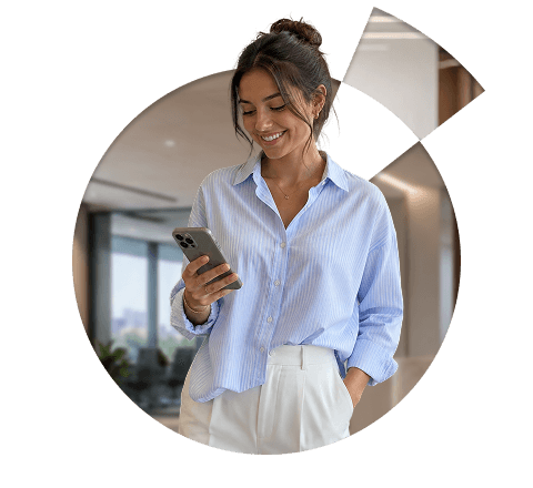 Business professional using a smartphone to manage business compliance and important deadlines.