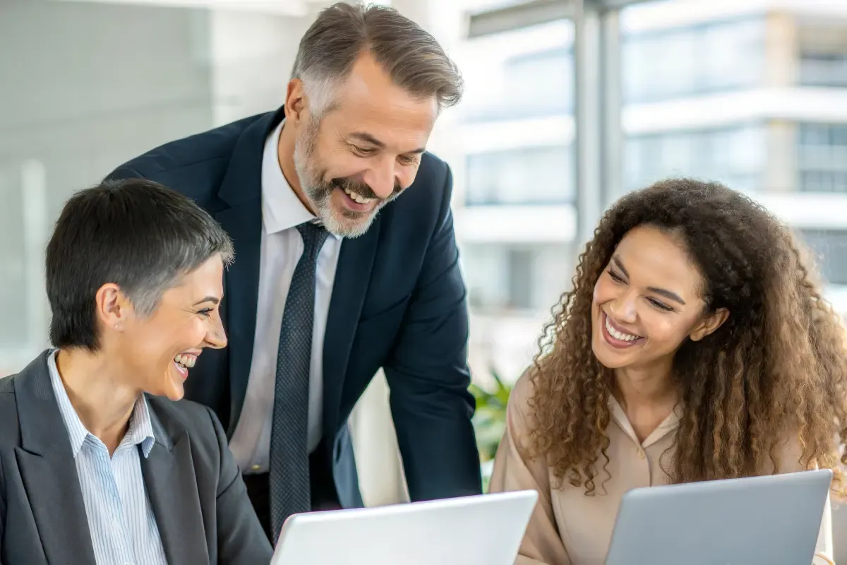 registered-agent-providers-img.webp Business team consulting on how to switch registered agent providers discussing legal compliance requirements and professional registered agent services transition.