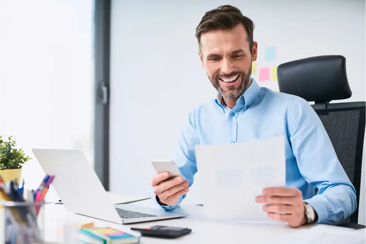 Business owner reviewing tax implications and state tax compliance documents for multi-state business expansion