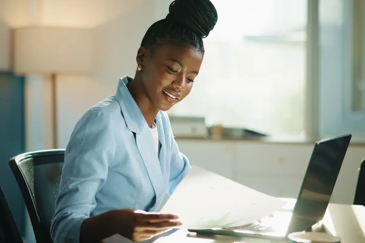 what-happens-when-a-business-closes-img.webp Business owner working on business closure paperwork and compliance requirements for dissolving company and handling legal obligations.