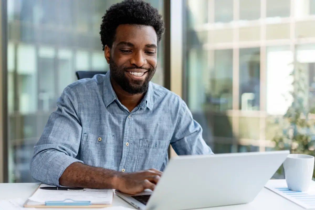 Business owner researching what is a registered agent service and comparing LLC registered agent requirements online