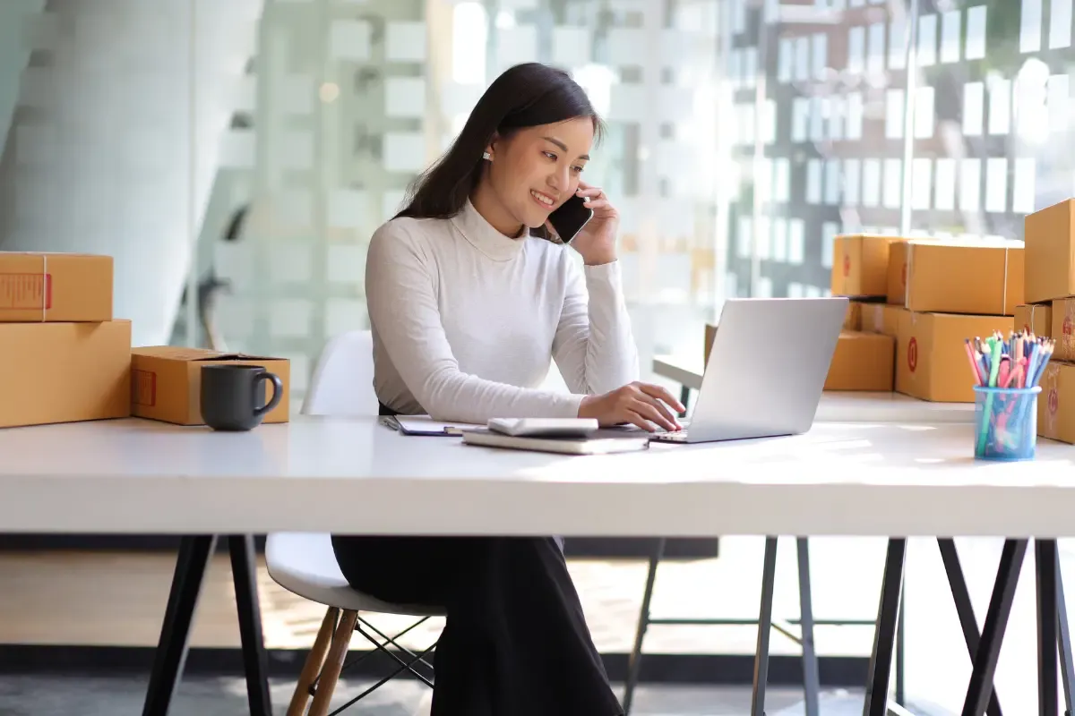 who-qualifies-to-be-a-registered-agent-img.webp Small business owner managing operations while using professional registered agent service for legal documents.